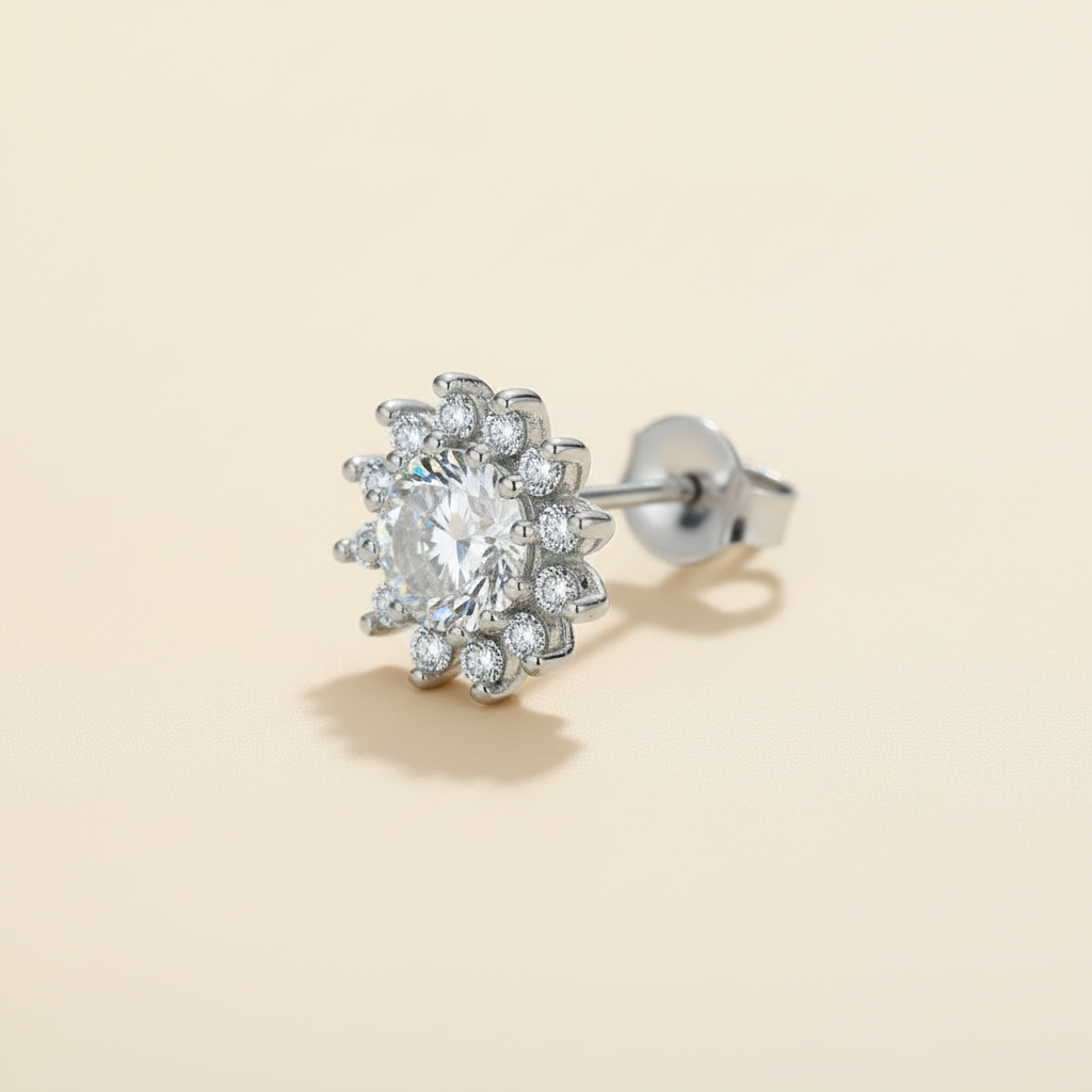 Close detail of a TAJIO silver-plated flower zircon earring