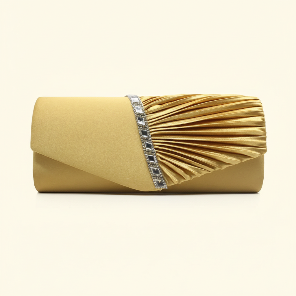 Gold pleated rhinestone evening clutch on a warm ivory background