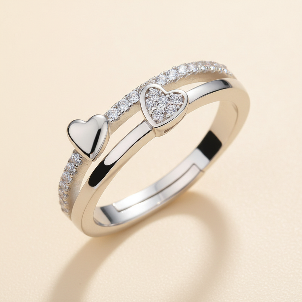 Close detail of the Double Heart Adjustable Ring in Platinum