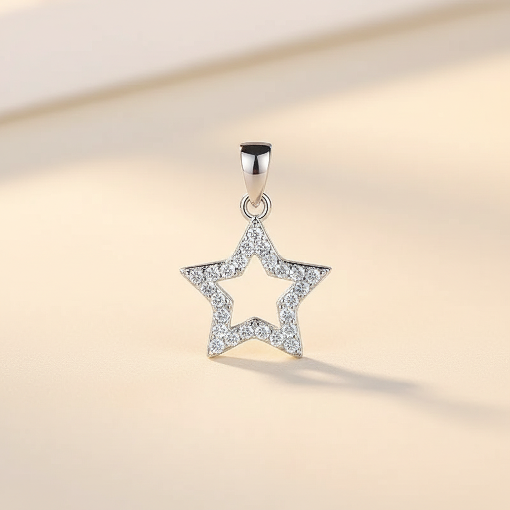 Close-up of a silver-tone open star pendant charm with sparkling stone accents on an ivory background